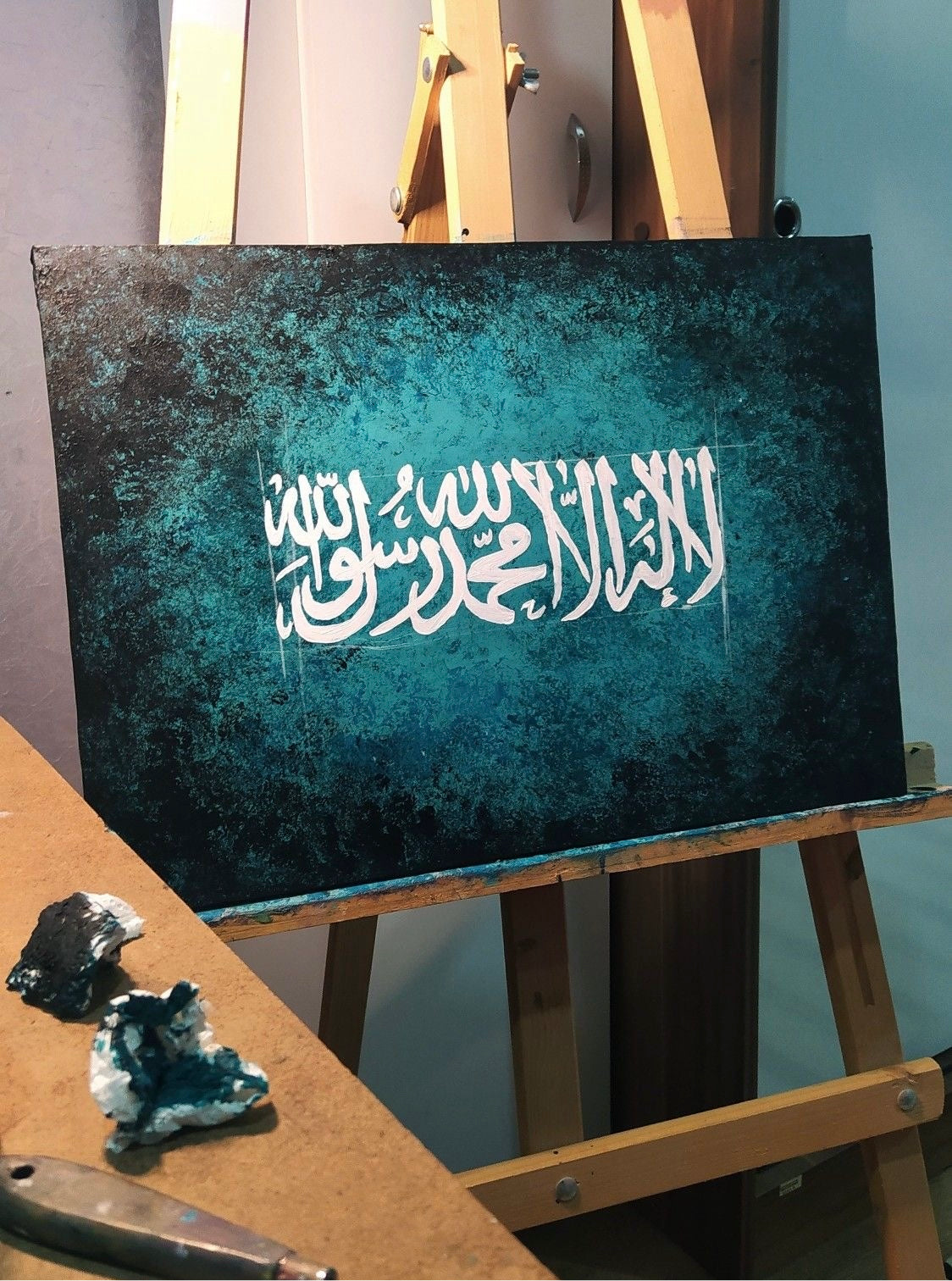Kalima beautiful blue, and black background calligraphy
